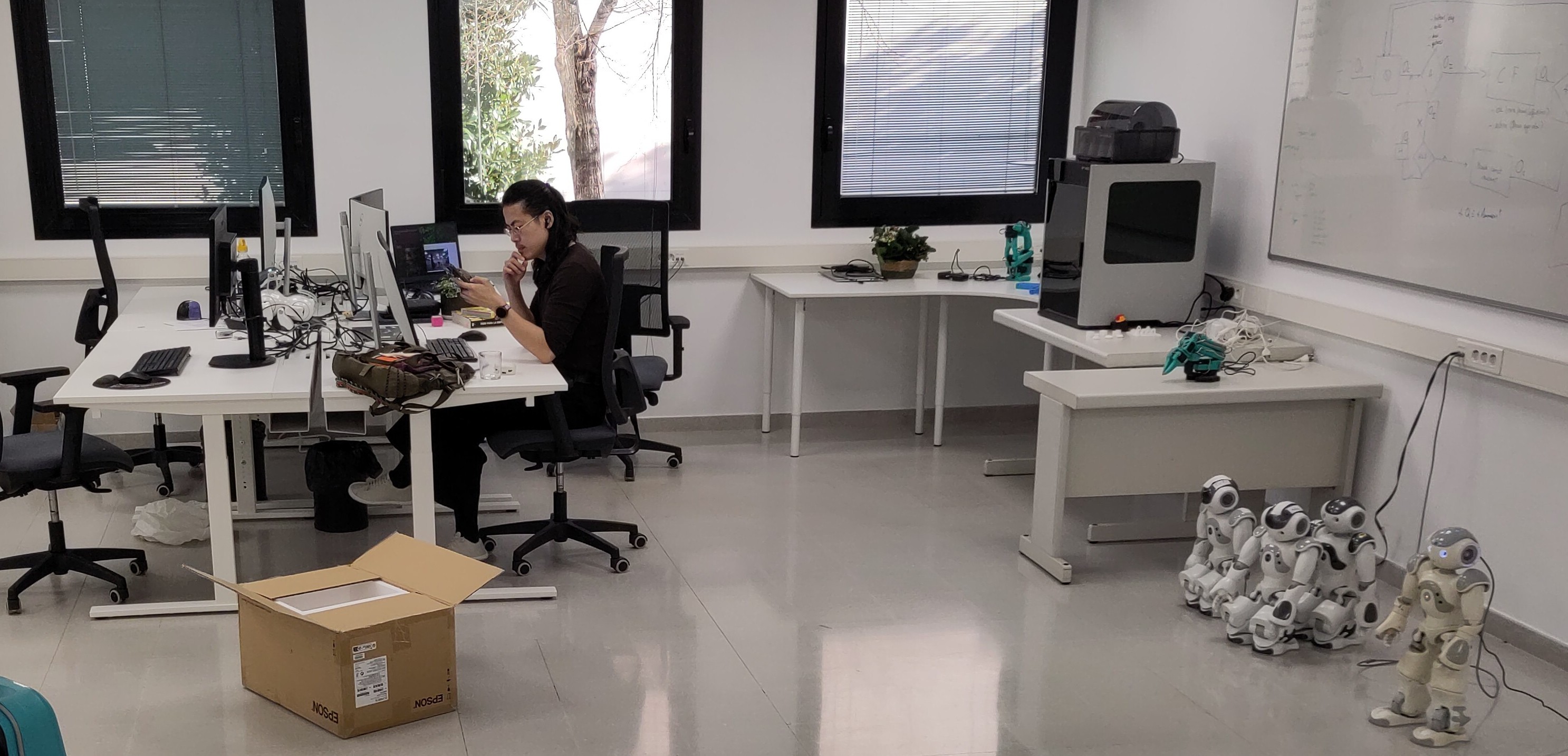 Baisong working in the lab